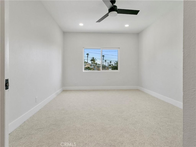 unfurnished room featuring a ceiling fan, recessed lighting, carpet, and baseboards