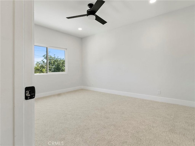 carpeted empty room featuring recessed lighting, baseboards, and ceiling fan