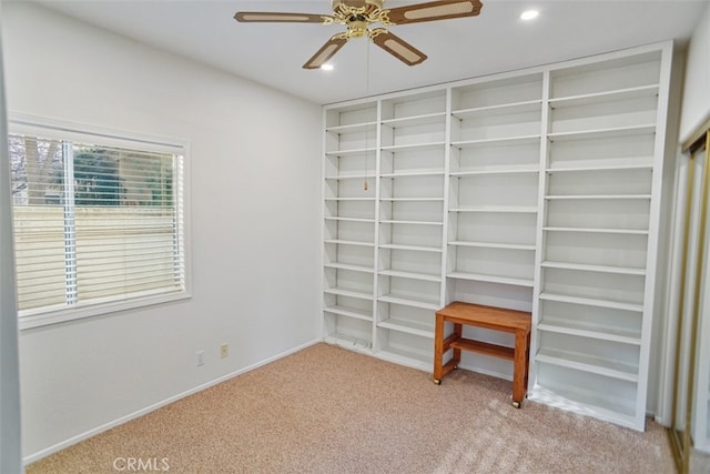 spare room with recessed lighting, baseboards, a ceiling fan, and light colored carpet