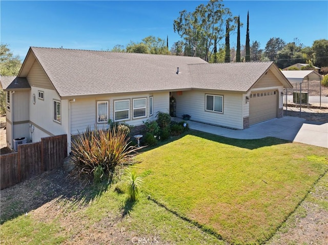 single story home with a garage, driveway, a shingled roof, fence, and a front lawn