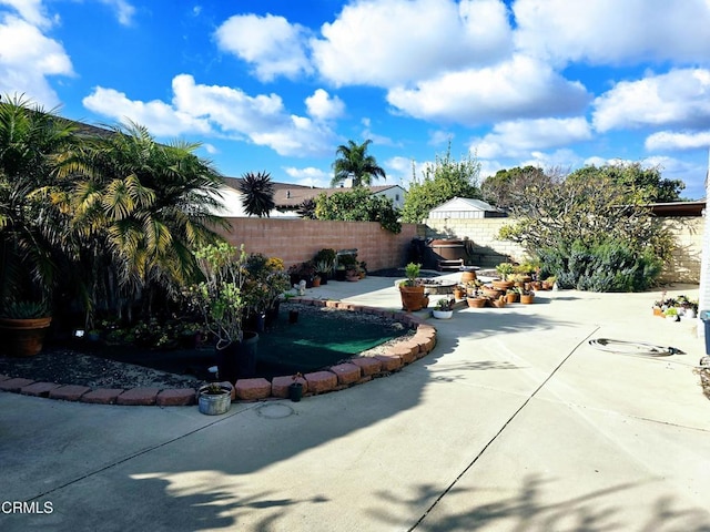 view of yard with a fenced backyard and a patio