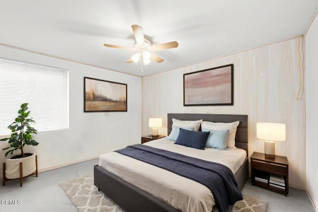 bedroom featuring baseboards and a ceiling fan