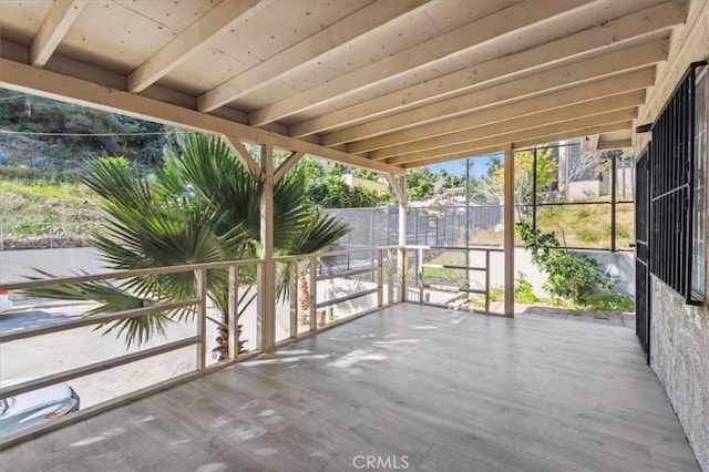 818 Record Ave, East Los Angeles, CA 90063 - unfurnished sunroom featuring beam ceiling