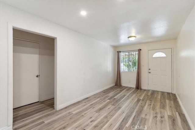 818 Record Ave, East Los Angeles, CA 90063 - entryway featuring light wood finished floors and baseboards