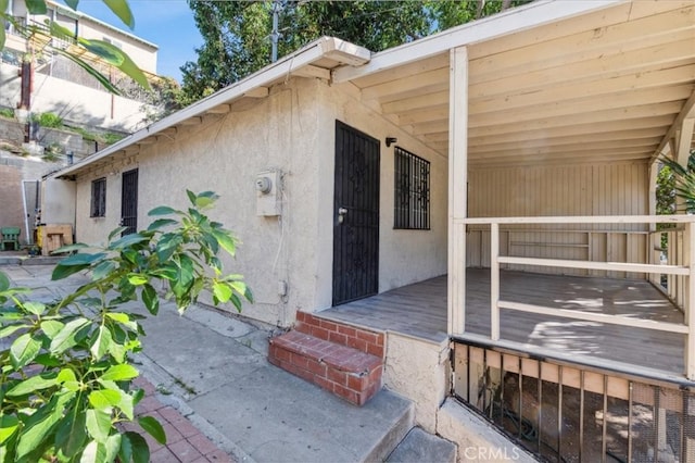 exterior space featuring stucco siding