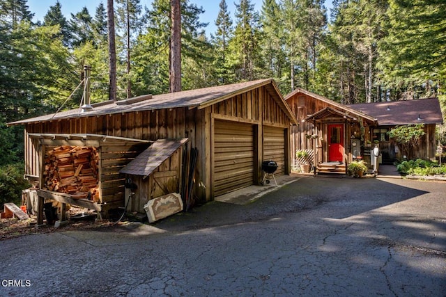 garage featuring driveway