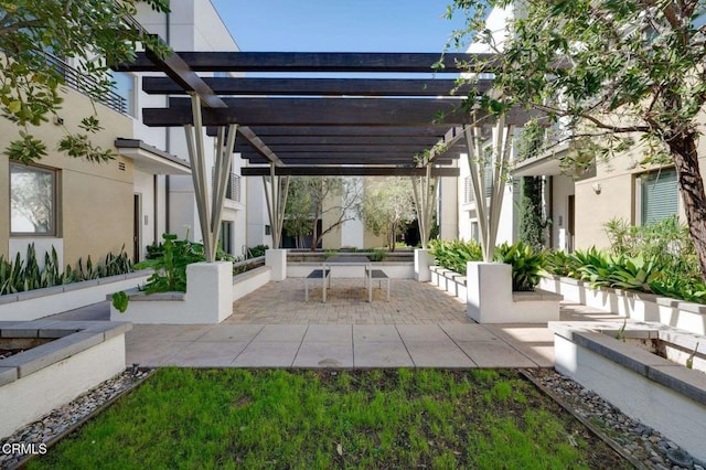 view of patio featuring a pergola