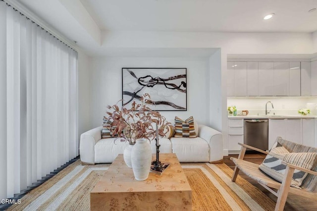 living area featuring recessed lighting and light wood finished floors