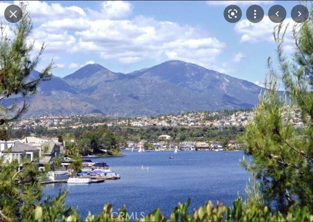 view of mountain feature featuring a water view