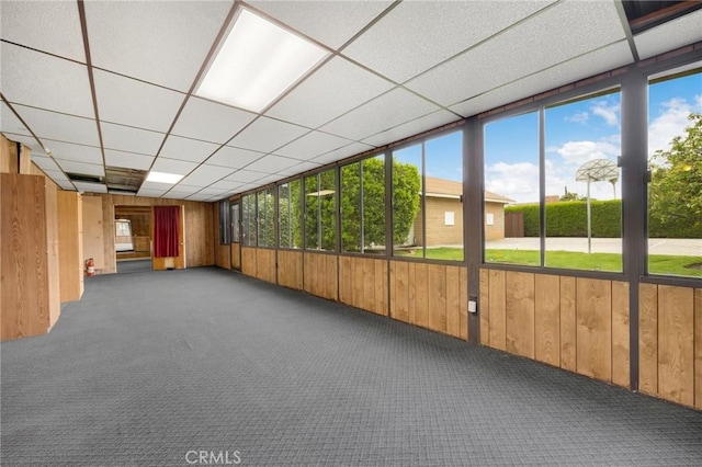 interior space featuring a paneled ceiling