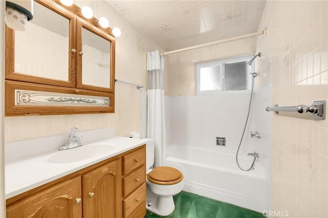 full bathroom with toilet, shower / bath combo with shower curtain, and vanity