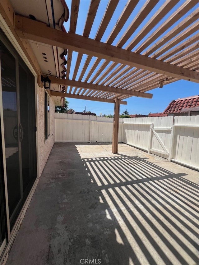 22822 Mesa Way Unit 1, Lake Forest, CA 92630 - fenced backyard with a patio, a pergola, and a gate