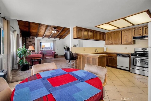 kitchen featuring stainless steel range with gas cooktop, wood ceiling, open floor plan, dishwasher, and under cabinet range hood