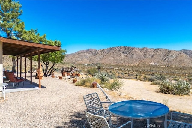 view of patio featuring a mountain view