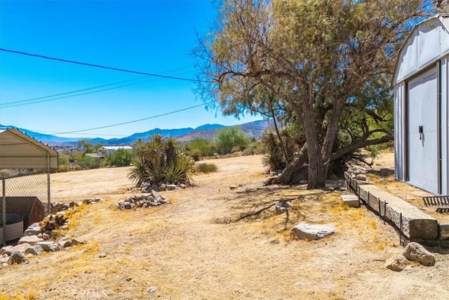 view of yard with a mountain view