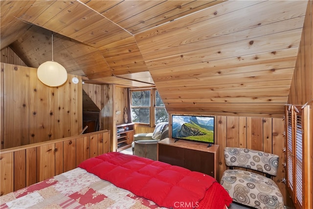 bedroom with vaulted ceiling, wood walls, and wood ceiling