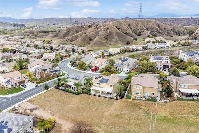 birds eye view of property with a residential view