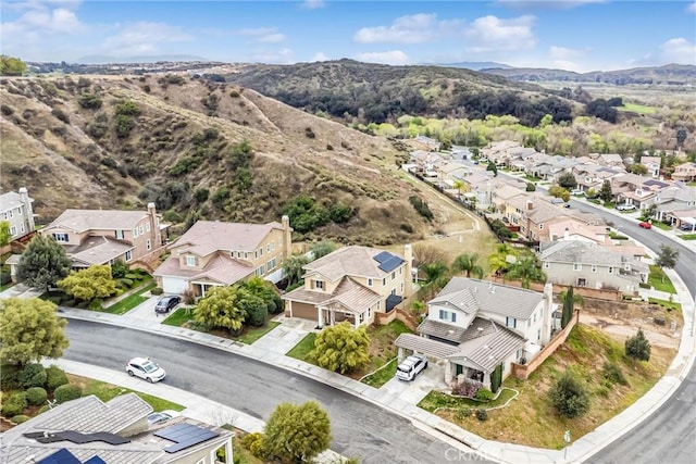 aerial view with a mountain view and a residential view