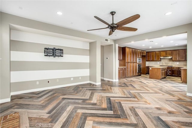 unfurnished living room with ceiling fan, recessed lighting, visible vents, and baseboards