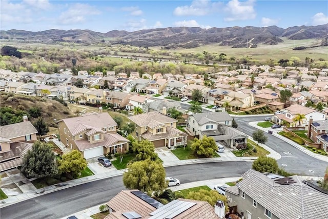 drone / aerial view with a mountain view and a residential view