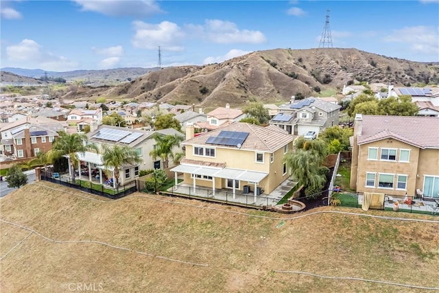 drone / aerial view with a mountain view and a residential view