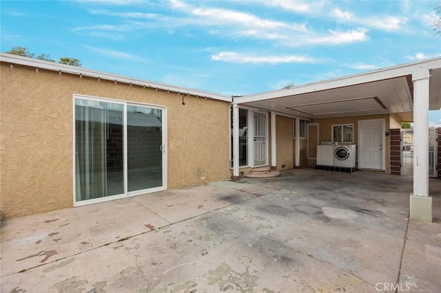 exterior space featuring washer / dryer