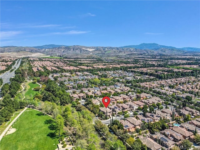 aerial view with a mountain view and a residential view