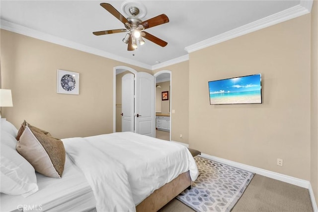 bedroom with a ceiling fan, baseboards, arched walkways, and ornamental molding