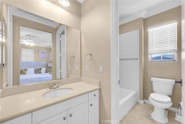 ensuite bathroom featuring connected bathroom, toilet, vanity, and ornamental molding