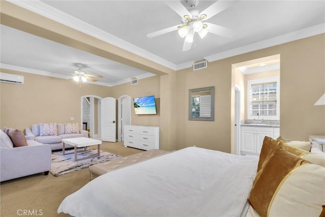 bedroom featuring a wall unit AC, visible vents, arched walkways, crown molding, and light colored carpet