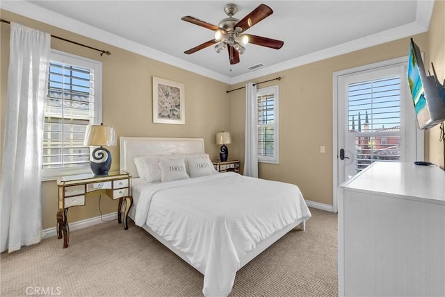 bedroom with visible vents, multiple windows, and ornamental molding