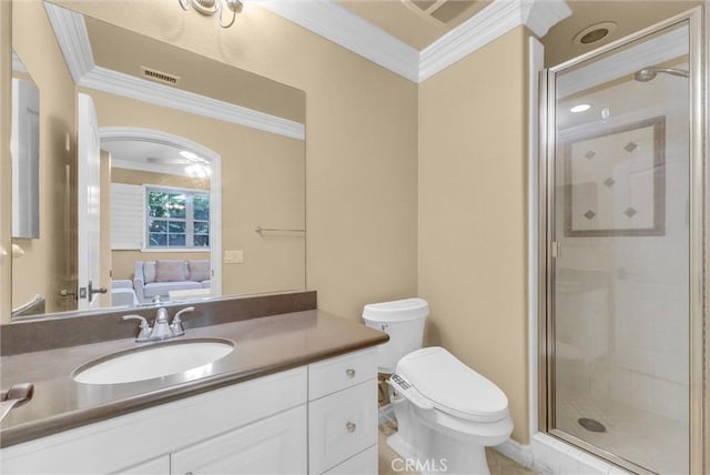 ensuite bathroom with vanity, a stall shower, crown molding, toilet, and connected bathroom