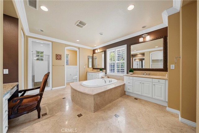 37 Shepard, Irvine, CA 92620 - bathroom featuring visible vents, a garden tub, ornamental molding, and a sink
