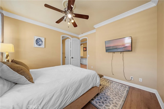 37 Shepard, Irvine, CA 92620 - bedroom with arched walkways, baseboards, a ceiling fan, wood finished floors, and crown molding