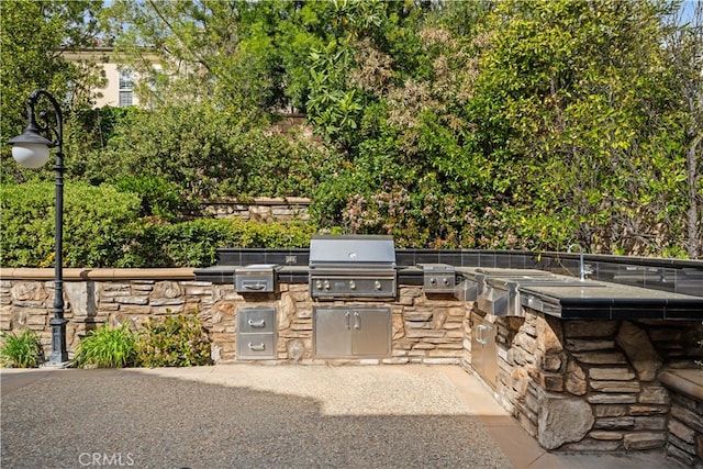 37 Shepard, Irvine, CA 92620 - view of patio / terrace featuring an outdoor kitchen and a grill
