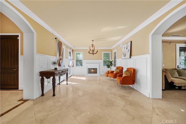 37 Shepard, Irvine, CA 92620 - living area featuring wainscoting, marble finish floor, and a decorative wall