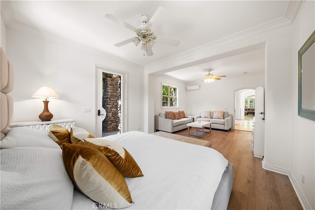 37 Shepard, Irvine, CA 92620 - bedroom with arched walkways, access to exterior, wood finished floors, an AC wall unit, and ornamental molding