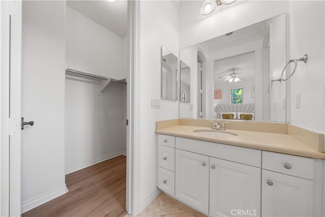 37 Shepard, Irvine, CA 92620 - bathroom with vanity, ceiling fan, wood finished floors, and a spacious closet