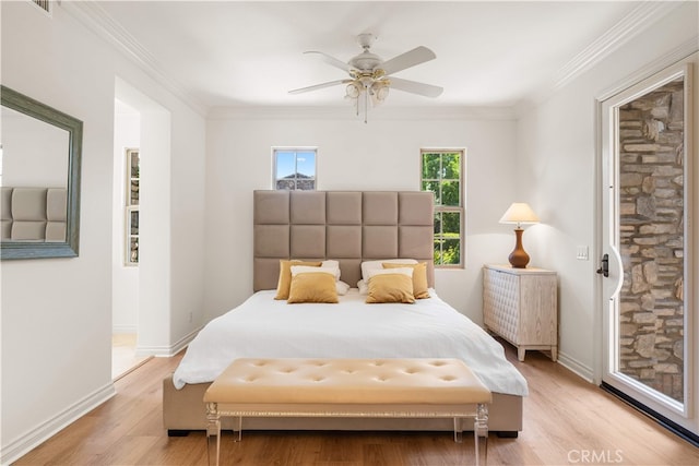 37 Shepard, Irvine, CA 92620 - bedroom featuring light wood-style flooring, ornamental molding, a ceiling fan, and access to exterior