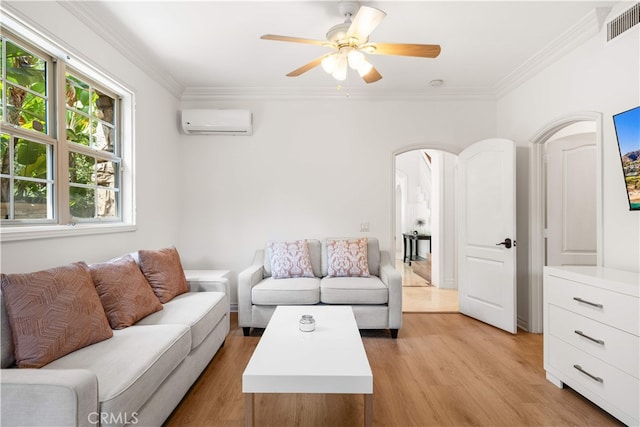 37 Shepard, Irvine, CA 92620 - living area featuring a wall mounted air conditioner, arched walkways, light wood-type flooring, ornamental molding, and ceiling fan