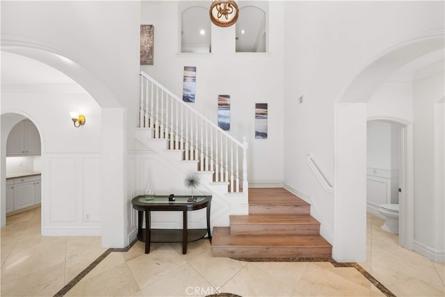 37 Shepard, Irvine, CA 92620 - stairs with arched walkways, inlaid floor details, and a towering ceiling