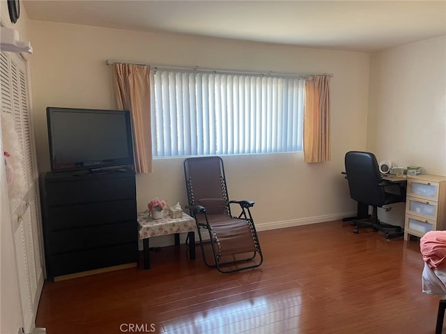 office featuring wood finished floors and baseboards