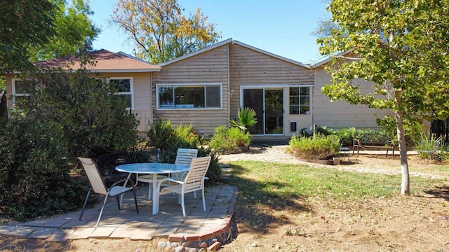 back of house featuring a patio area