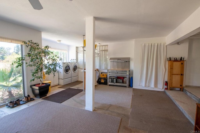 interior space featuring washer and dryer and a healthy amount of sunlight