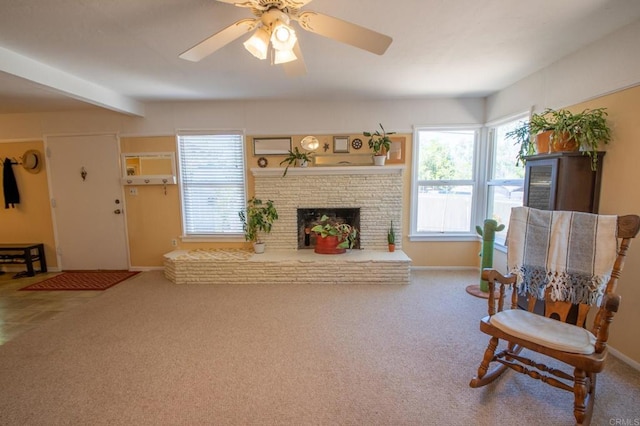 interior space featuring plenty of natural light, carpet flooring, and a fireplace