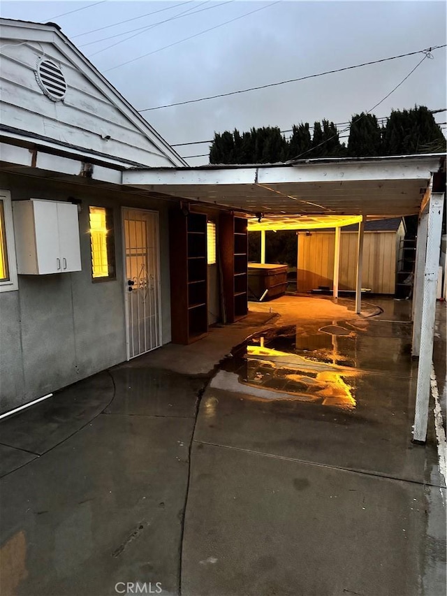 exterior space with a carport