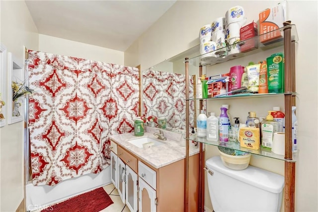 full bathroom featuring toilet, tile patterned floors, and vanity