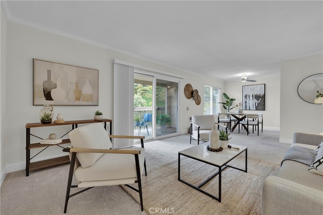 carpeted living room with crown molding and baseboards