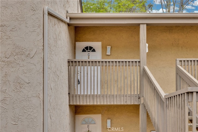 exterior details featuring stucco siding