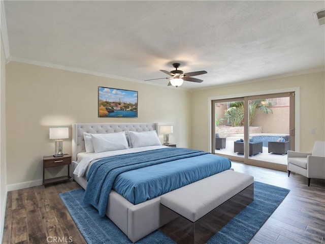 bedroom featuring crown molding, baseboards, dark wood finished floors, and access to exterior